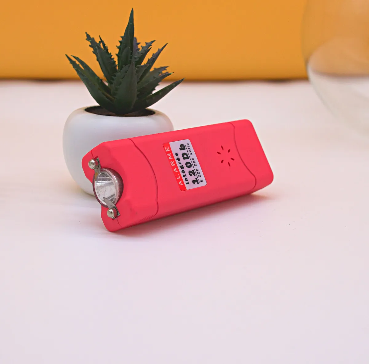 Shocker taser de poche rose avec Alarme intégrée Pelta