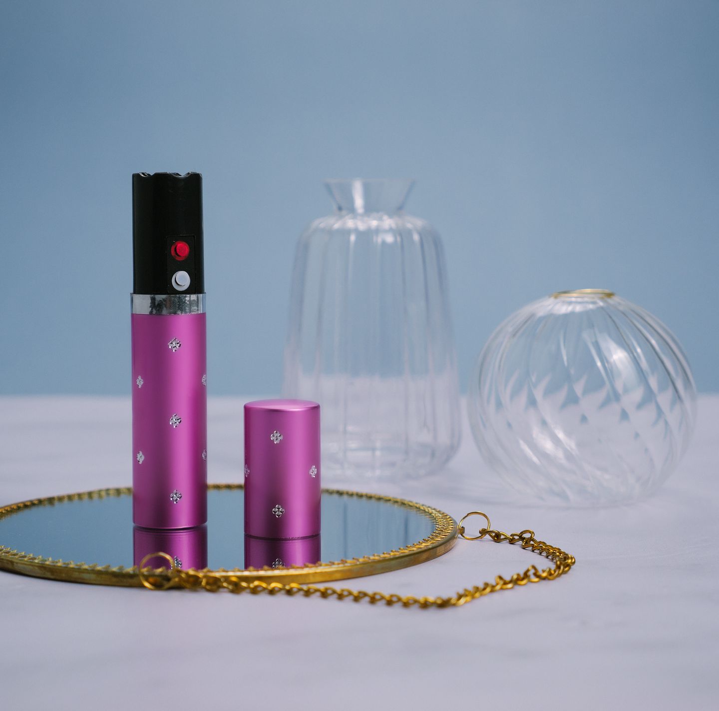 Shocker & Taser - Taser linterna rosa en forma de barra de labios rosa.